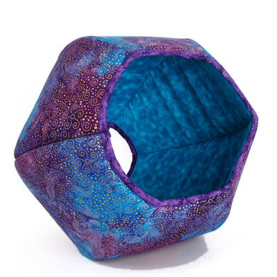 The Cat Ball® cat bed is made for anyone who loves purple!  We have paired a purple and turquoise batick with gold metallic swirls with a turquoise lining. 
