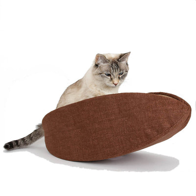 The Cat Canoe® taco-shaped modern cat bed is made here in neutral brown cotton printed to look like woven burlap. The lining is a coordinating irregular stripe. The cat model weighs about 7 pounds, and our modern pet bed fits animals to about 18 pounds. 