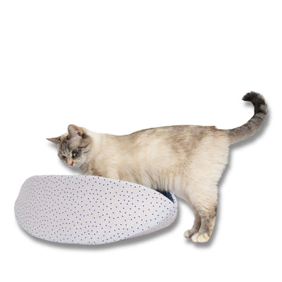 Our Indigo Hearts Canoe® modern cat bed, which coordinates with other beds in our collection. Our taco-shaped pet bed fits cats to about 18 pounds and is made in the USA.