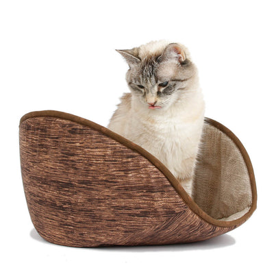 Front view of our newly designed jumbo-size Cat Canoe® modern cat bed. Designed to accommodate 18-pound cats (and larger) the fabric-covered foam panels will press out, then bounce back in to hold your cat closely, helping to retain heat. Made in USA