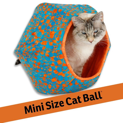 A seven pound cat inside our mini-size Cat Ball ® cat bed, made in a colorful orange and turquoise batik. This small bed is great for kittens and tiny cats. 