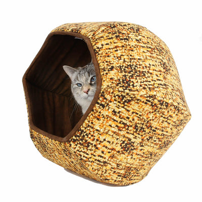 Cat Ball® modern cat bed made in an abstract fabric in shades of orange and brown with metallic gold details. 