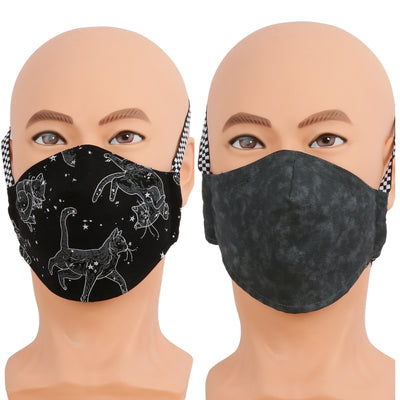 Reversible face mask in black constellation cats fabric. Triple layer cotton fabric mask with filter pocket and nose wire. Adjustable behind the head band to keep the pressure off of your ears, or adjustable ear loops. Made in USA.