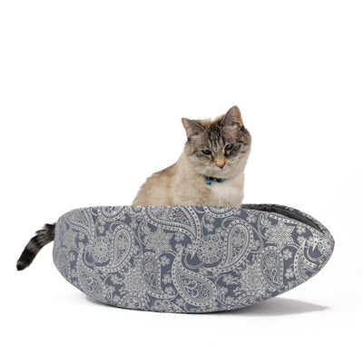 The Cat Canoe® modern cat bed is made here with silver paisley fabric. Our taco-shaped cat bed is designed to wrap around your pet, creating a snuggly nest. 
