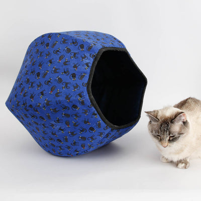These beds are one of three designs we made with coordinating Halloween black cartoon cat fabrics. The cat fabric has a distressed look, with "rubbed" areas that are lighter.