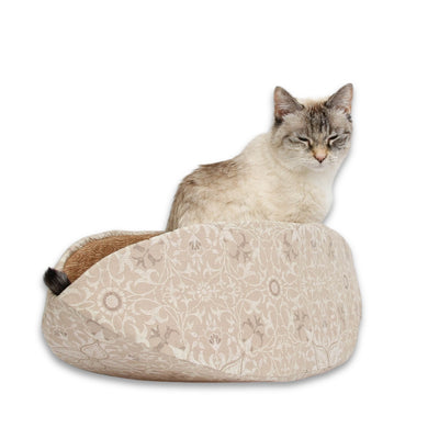 Looking for a cat bed with a neutral palette with a natural look? Our Cat Canoe® is made with a William Morris fabric and lined with a faux wood grain print fabric. 