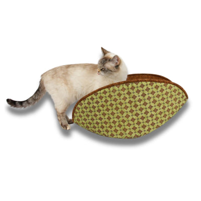Our jumbo Cat Canoe® is sized for bigger cats and made in a green foulard print with a coordinating brown lining. Our hand made cat beds use cotton fabrics over flexible foam panels. 