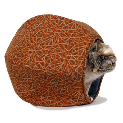 The Cat Ball® cat bed is a modern cat bed design, a cave-like pet bed with two openings because all cats want two doors to choose from.  This neutral color Cat Ball® is made with smooth 100% cotton fabrics .