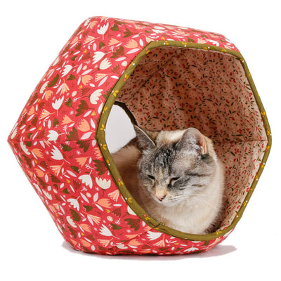 The Cat Ball® cat bed is a hexagonal, cave-style cat bed with two openings, made here with coordinating floral fabrics. Our innovative modern cat beds are made in the USA and ready to ship. 