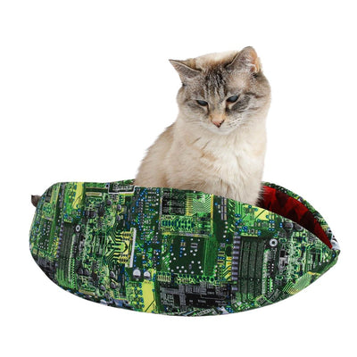 This Cat Canoe®combines all of the most essential things in life into one cozy, boat-shaped pet bed! A realistic green computer motherboard fabric lined with red coffee cups. This will be a fun cat bed for under the Christmas tree! Made in the USA for cats about 18 pounds, using cotton fabrics and flexible foam panels.
