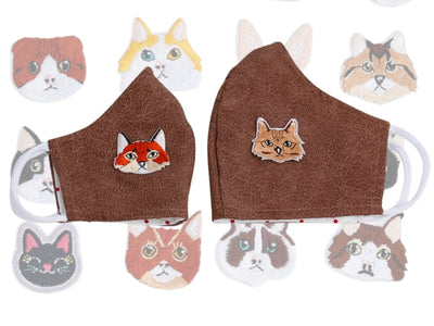 Customize your face mask with an embriodered patch that looks like an adorable cat! We will sew these patches onto your face mask. 
