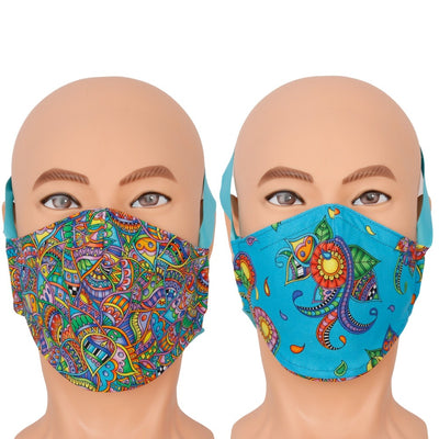 Reversible face mask made with coordinating floral paisley fabrics in bright colors. Triple layer cotton fabric mask with filter pocket and nose wire. Adjustable behind the head band to keep the pressure off of your ears, or adjustable ear loops. Made in USA.